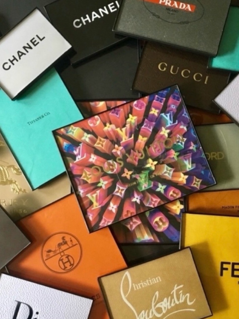 Handcrafted wall decor from authentic designer boxes and bags